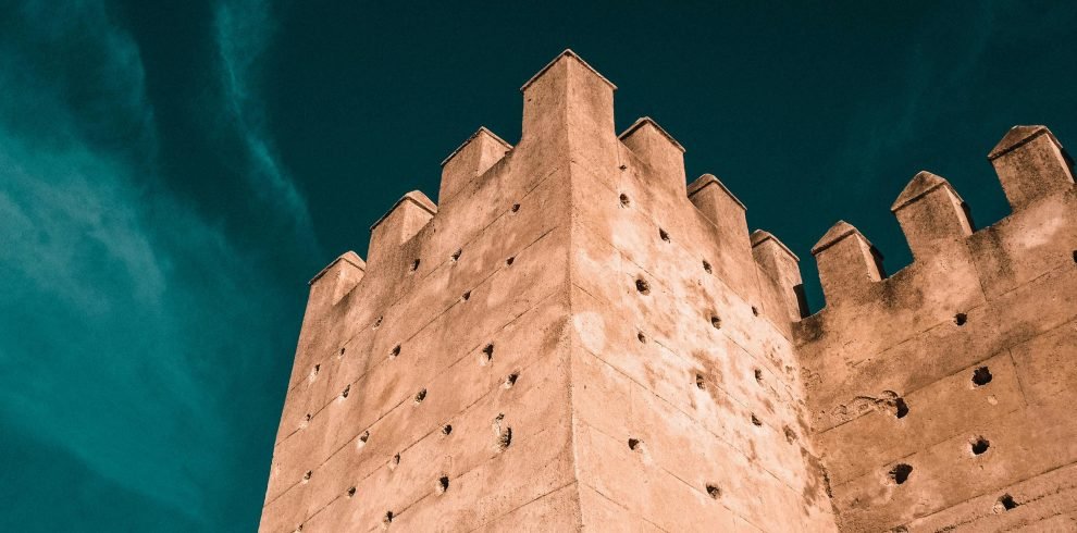 A stunning capture of the historic fortification wall in Fes, Morocco, showcasing traditional architecture.